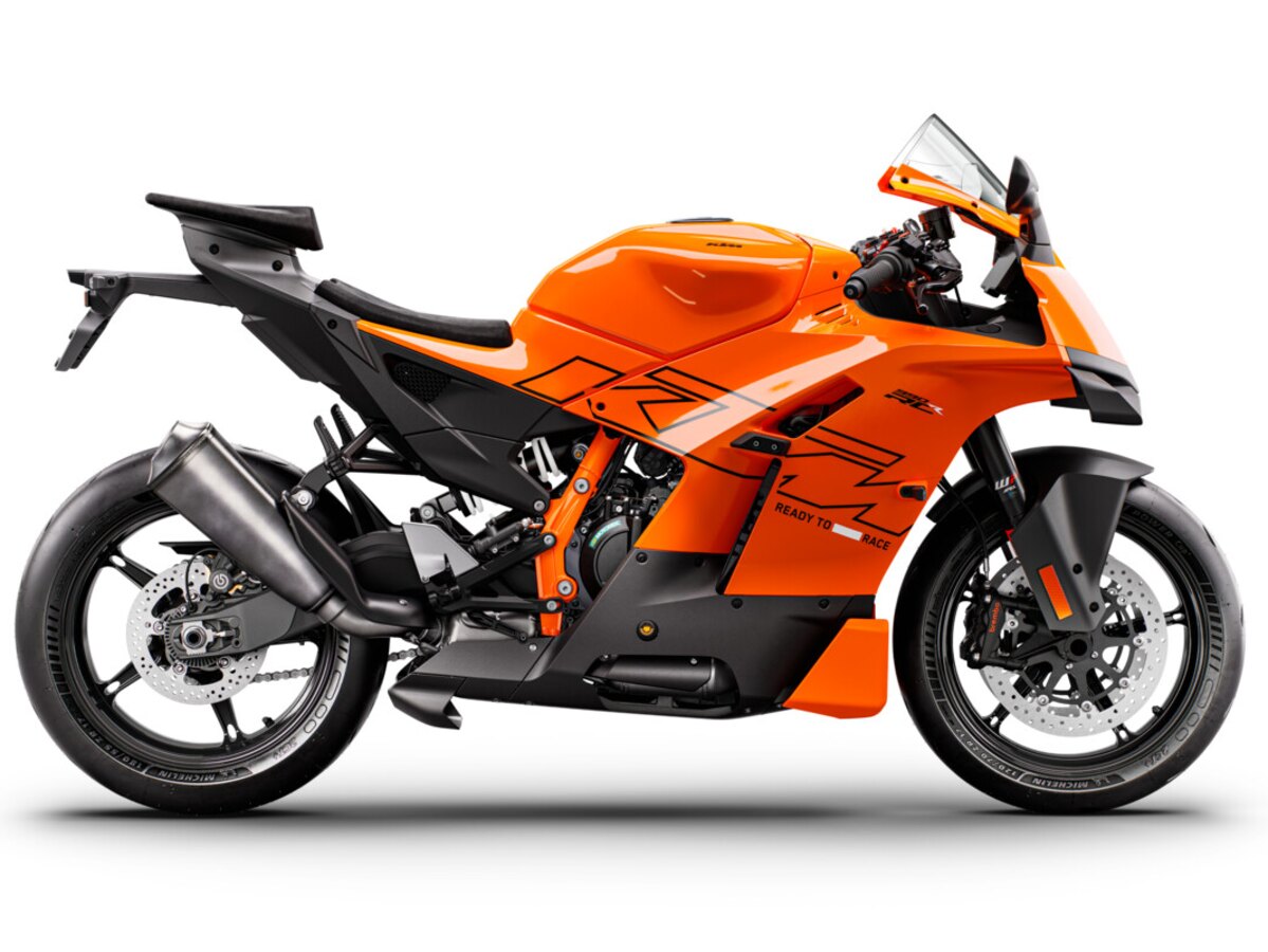 Studio side profile of an orange KTM 990 RC R